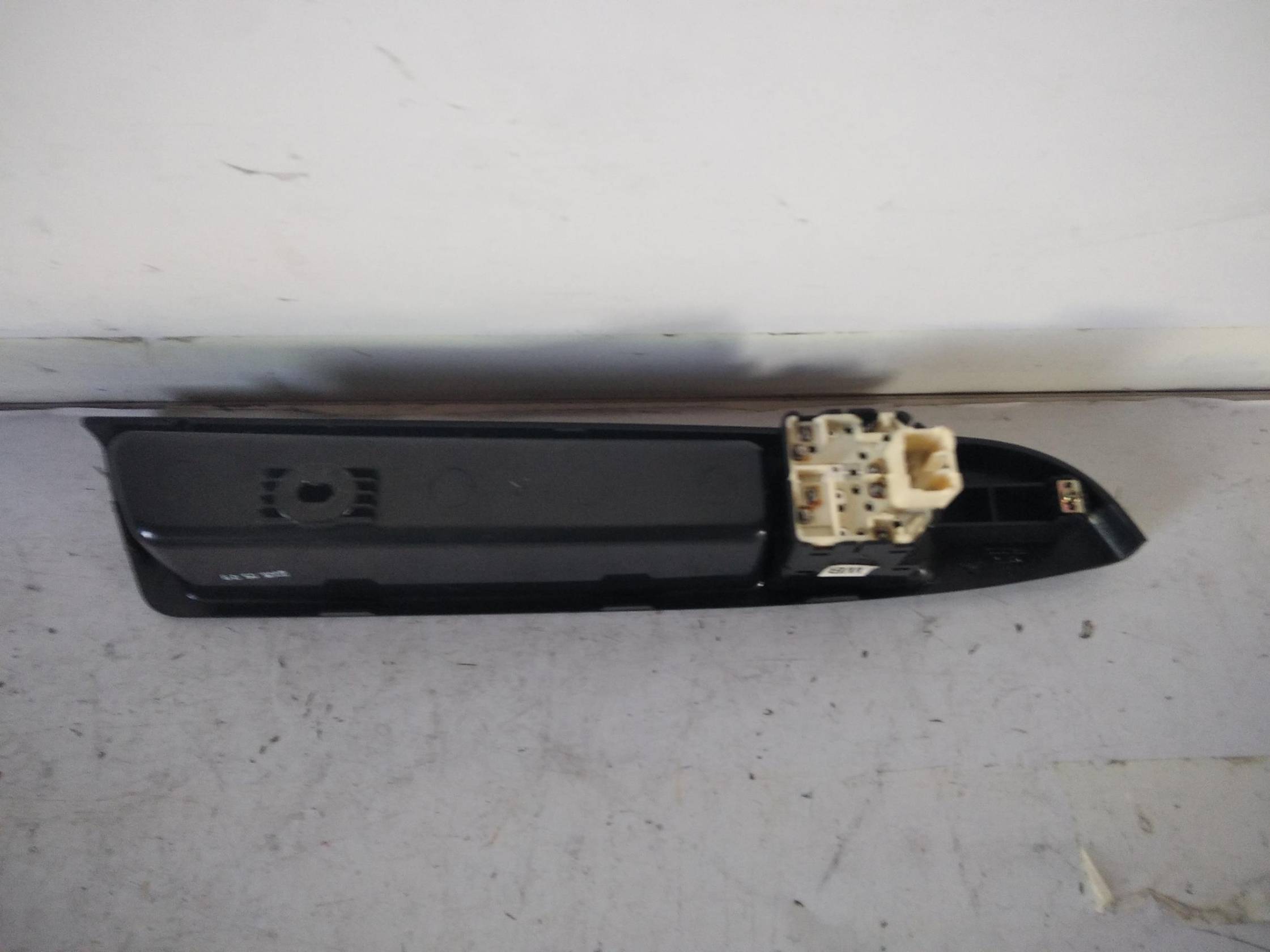 Interruttore alzacristalli porta ant. sx.